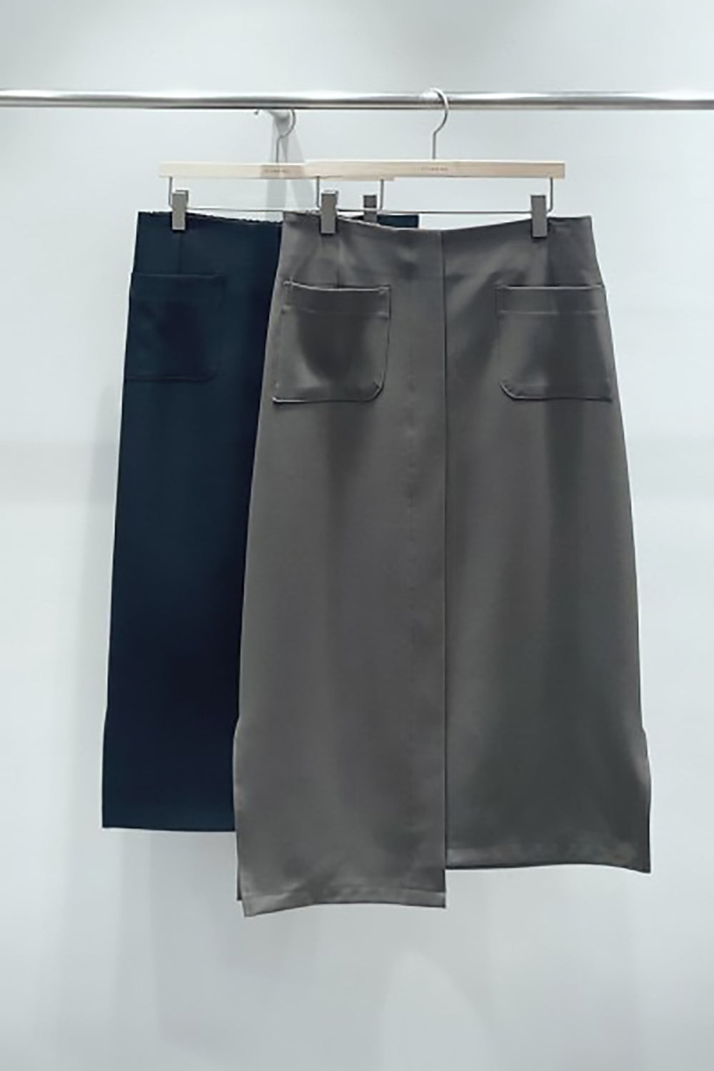 Front Pocket Asymmetrical Midi Skirt